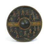 A Burmese bronze gong with painted scene of figures in a procession, 28cms (11ins) diameter.