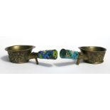 A pair of Chinese brass and enamel silk irons, 4cms (4.25ins) long (2).