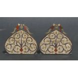 A pair of Indian enamelled brass bookends, 14cms (5.5ins) wide.