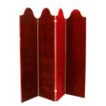 A four fold red velvet screen or room divider, 202cms (79.5ins) high and 204cms (80.5ins) wide