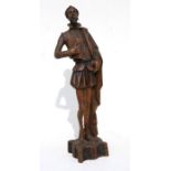 A carved wooden figure depicting Don Quixote, 56cms (22ins) high.