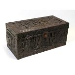 A Chinese carved camphorwood trunk, 89cms (35ins) wide.