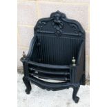 A cast iron fire grate, 49cms (19ins) wide.