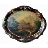 A late 18th / early 19th century Ponypool Japanned tray with central oval river scene within