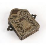 A Moroccan silvered brass Koran box of rectangular form with arched lid, the front with circular