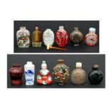 A group of Chinese snuff bottles to include blue & white, agate, glass overlay and reverse painted