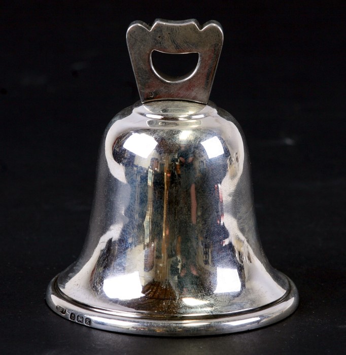 A silver bell, Birmingham 1934 and makers mark for Deakin & Francis, 7.5cms (3ins) high.