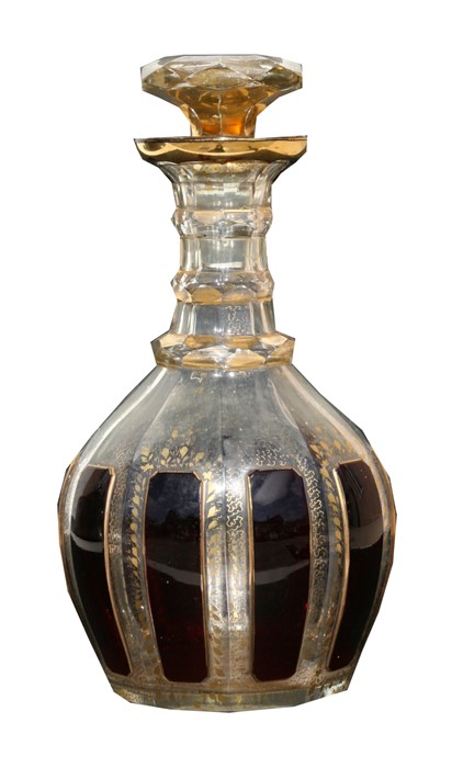 A Victorian gilded and flashed glass decanter, 24cms (9.5ins) high.