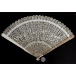 A large 18th / 19th century Chinese ivory fan of exceptional quality, 27cms (10.5ins) long Condition