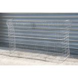 A galvanised nursery fender, 114cms (45ins) wide.