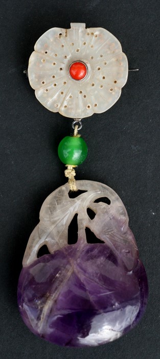 A Chinese jade flower brooch with carved amethyst peach drop, 9cms (3.5ins) high.Condition