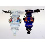 Two 19th century Bohemian glass chancery lamps decorated with crosses and foliate scrolls, the