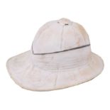 An early 20th century Foreign Service British Army blancoed tropical pith helmet with 6 fold