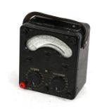 A Universal AVOMETER vintage voltmeter in a Bakelite case, 18cms (7ins) wide.