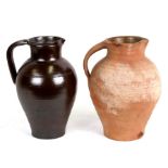 A Lake's Cornish Pottery earthenware jug, 28cms (11ins) high; together with another similar