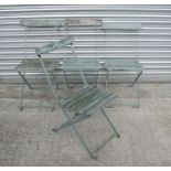 A set of four folding garden chairs with slatted seats and backs