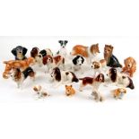 A large quantity of Sylvac dogs to include Spaniels, Labradors, a Yorkshire Terrier and others (