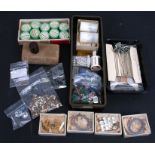 A quantity of costume jewellery repair items, to include silver chains and rolled gold jump rings.