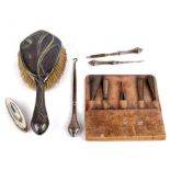 An Art Nouveau WMF silver plated hair brush; together with other silver handled manicure items.