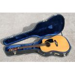 A vintage Ibanez AE300 Electro Acoustic guitar in a Fender hard case.