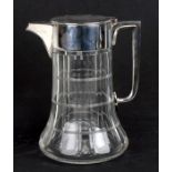 An early 20th century silver plated mounted cut glass lemonade jug, 23cms (9ins) high.Condition