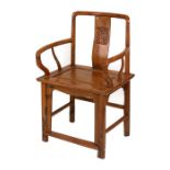 A Chinese elbow chair with solid seat.