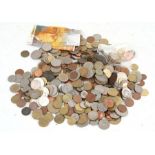 A quantity of loose coinage, mostly foreign.
