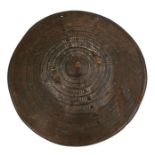 A Sudanese elephant hide tribal shield, 44cms (17.25ins) diameter.