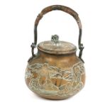 A Japanese brass pot & cover decorated with figures, the cover with a monkey finial, 18cms (7ins)