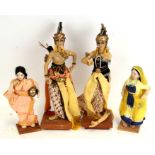 An Indian Christa Seva Mandir doll, 23cms (9ins) high; together with another similar and two wax
