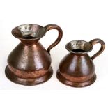 Two Victorian copper harvest jugs, half pint and one pint capacity, with London Excise marks, the