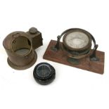 J N Lowther & Co Ltd, Boat Builder - a brass gimbaled ship's compass mounted on a plinth, 25.5cms (