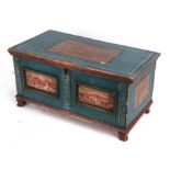 A continental painted pine box with panels decorated with landscape scenes, 47cms (18.5ins) wide.