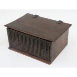 An 18th / 19th century carved oak box, 39cms (15.5ins) wide.