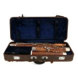 A Bassoon with silver plated mounts and keys, cased.