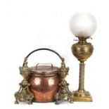 A Victorian brass oil lamp with opaque glass shade, 50cms (20ins) high; together with a pair of