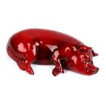 A Royal Doulton flambe pig, 13cms (5ins) wide.Condition ReportA chip to the underside of the right