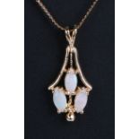 A 14ct gold opal pendant on a 14ct gold chain.Condition ReportOpals good condition with no cracks,