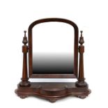 A Victorian mahogany toilet mirror, 70cms (27.5ins) wide.