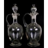 A pair of 18th century style clear glass decanters and stoppers, 36cms (14ins) high (2).Condition