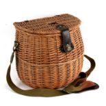 A wicker fishing creel, 33cms (13ins) wide.