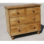 A pine chest of drawers with two short and two long drawers, 90cms (35.5ins) wide.