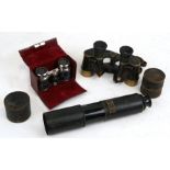 A pair of Carl Zeiss German military binoculars; together with a French military black lacquered