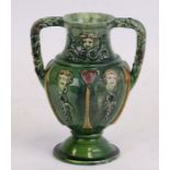 A Castle Hedingham two-handled vase by Edward Bingham, decorated with figures and Tudor motif,