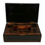 A 19th century Anglo-Indian ebony workbox with fitted interior, 37cms (14.5ins) wide.