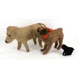 A post WWII Steiff style plush toy dog; together with two other plush toy dogs (3).