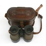A pair of British military WWI binoculars, cased, initialled 'MGC 1914'.Condition Reportmoving