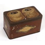 A toleware style tin string box, 17cms 96.75ins) wide.