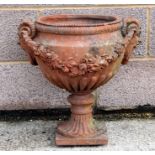 A terracotta urn of classical form, 48cms (19ins) high.Condition ReportMinor chips to the rim