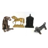 A group of door stops to include dogs and horses